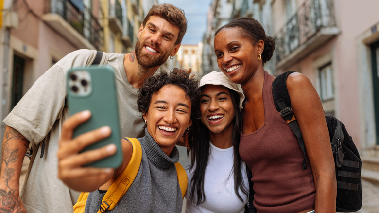 A group of friends taking a picture while abroad