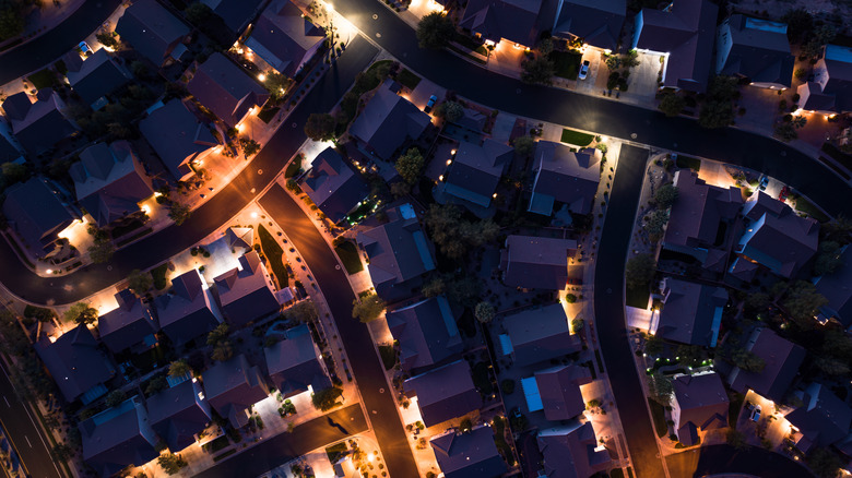 Shot from the air of a neighborhood at night