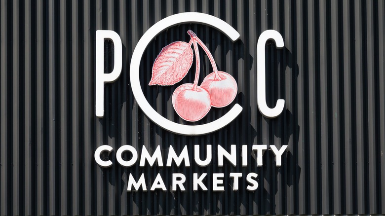 PCC Community Markets retail grocery store exterior and trademark logo on storefront.