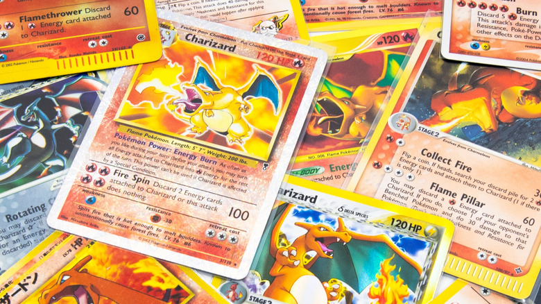 Charizard Pokemon cards piled on top of each other