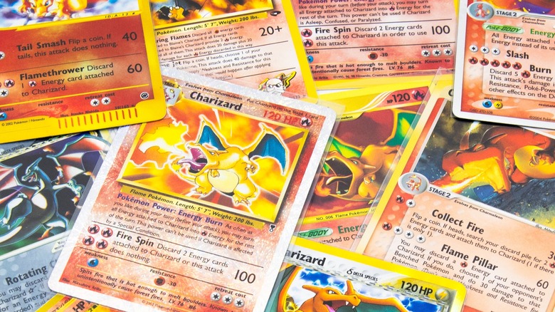 Charizard Pokemon cards piled on top of each other