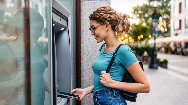 woman using an ATM