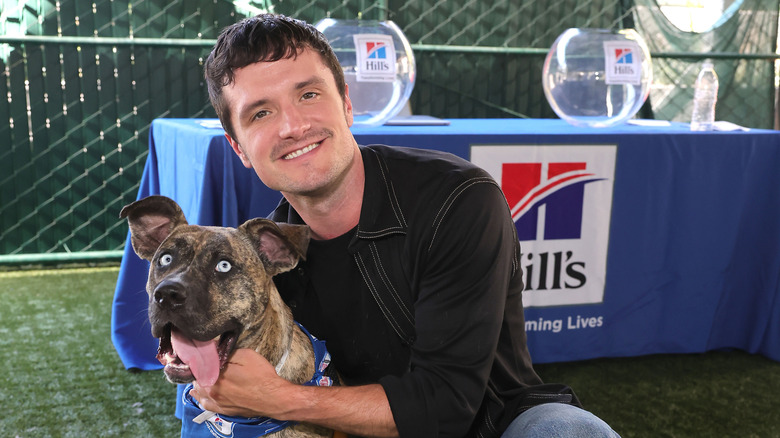 Josh Hutcherson with a dog
