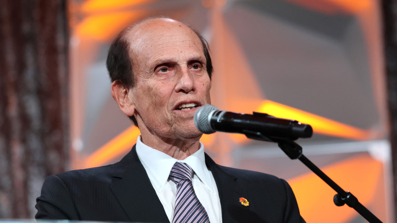 Michael Milken giving a speech