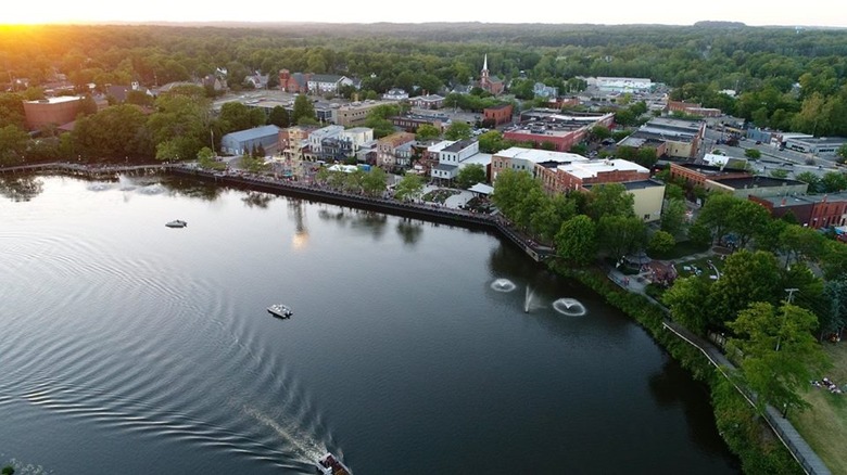 An overhead lakeside view of the City of Allegan's lakefront and buildings.