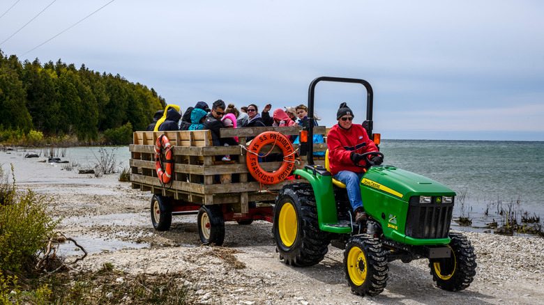 Locals taking a lakeside tractor ride in Baileys Harbor, Wisconsin