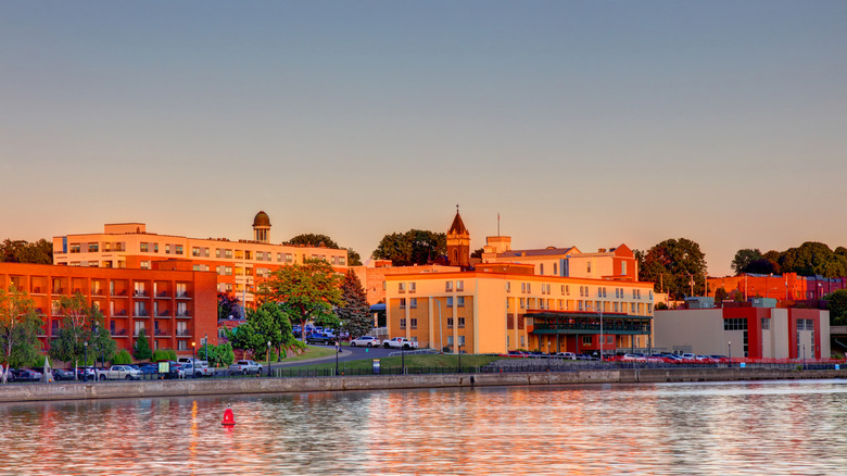 A waterfront view of Oswego, New York at sundown overlooking Lake Ontario