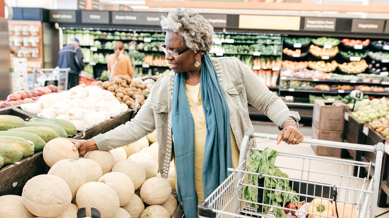 Senior woman grocery shopping