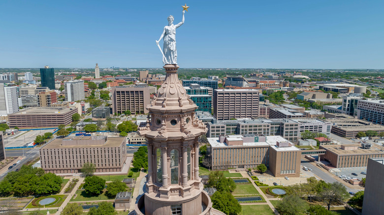 welcome to Texas road sign with blue sky