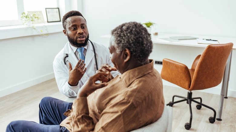 senior visiting her doctor