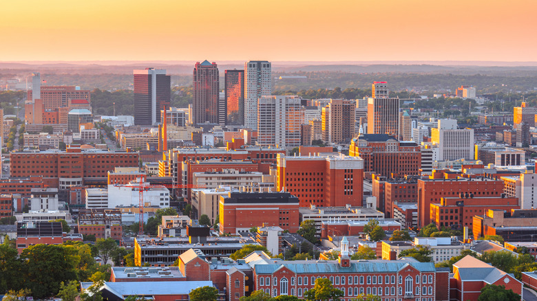golden rays of sunset reflect off the Birmingham, Alabama skyline