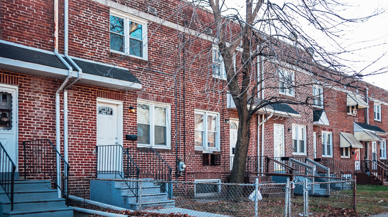 A row of attached brick rowhouses in Camden, New Jersey