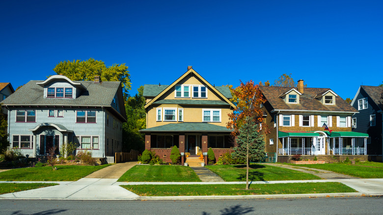A row of three two-story homes in a Cleveland, Ohio neighborhood