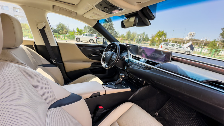 The interior of a 2019 Lexus ES 350 with tan leather seats