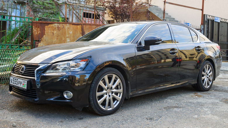A black Lexus ES 330 parked on the street