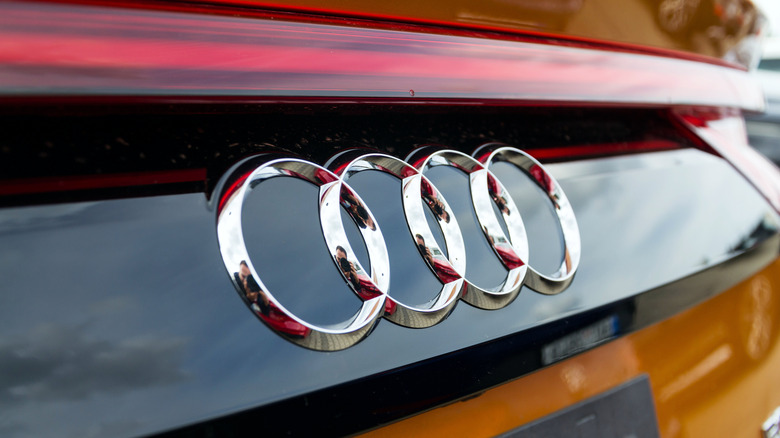 The Audi company logo on car.
