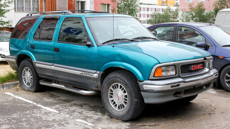 GMC Jimmy in parking spot