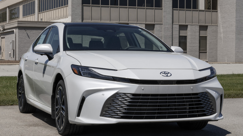 A white Toyota camry