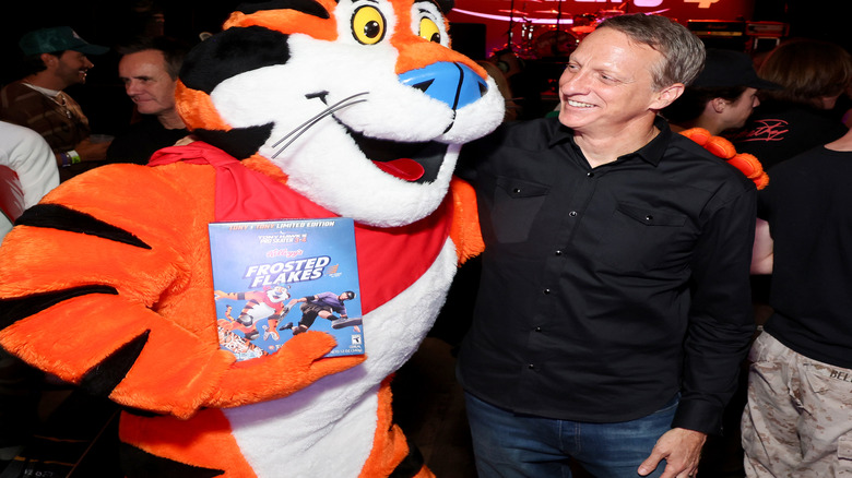 Tony Hawk with Tony the Tiger holding cereal