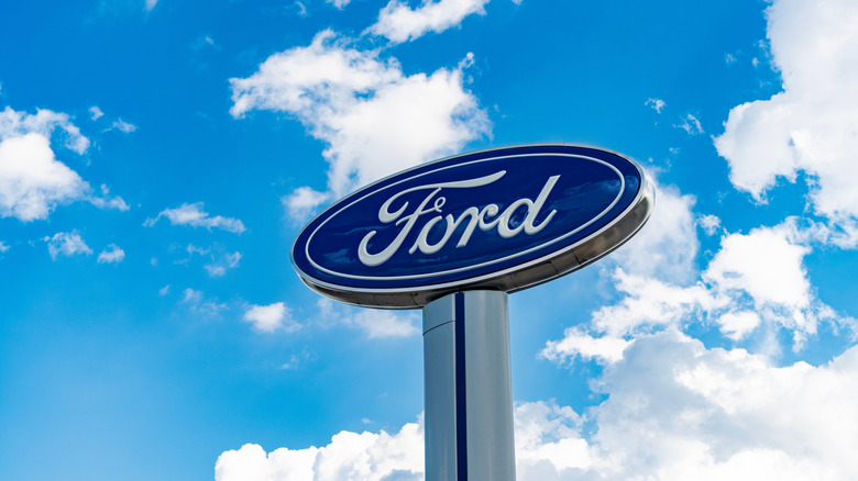 Ford logo sign with blue sky background