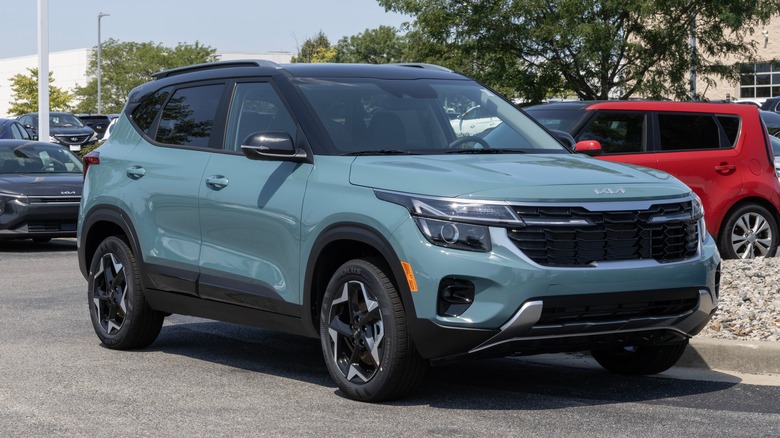 Kia Seltos S AWD Compact SUV display at a dealership.