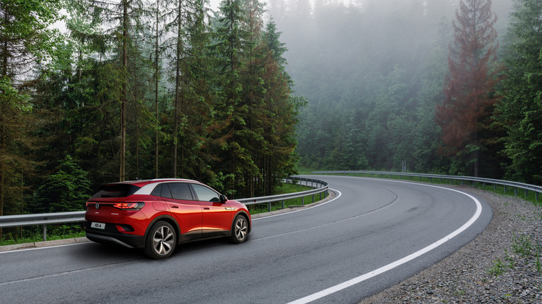 A red Volkswagen ID.4 on the road in Ukraine in 2021.