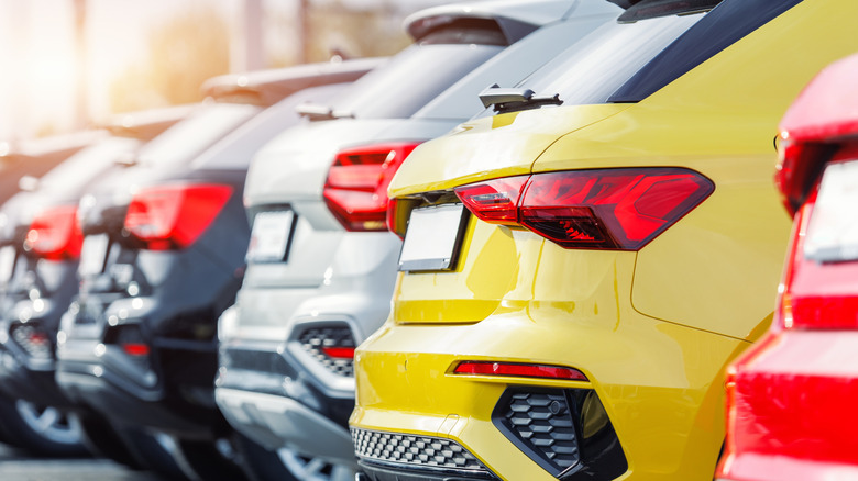 Hybrid SUVs in dealership.