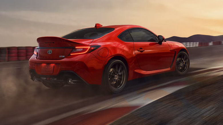 red 2026 Toyota GR86 in inner lane of race track