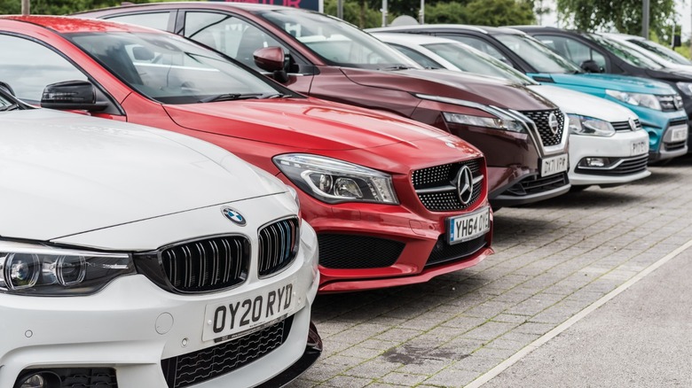 Various European car models parked in a row