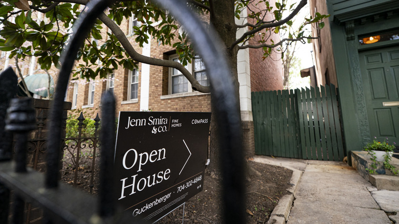 Open House sign in front of a home.