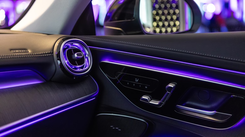 violet-colored LEDs illuminate the front passenger area