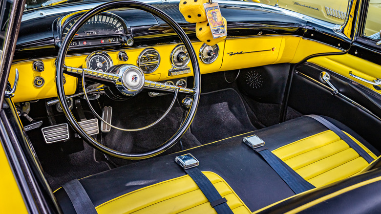yellow dashboard and upholstery in a vintage Ford