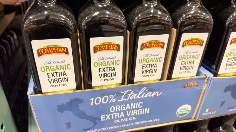 olive oil in box on shelf
