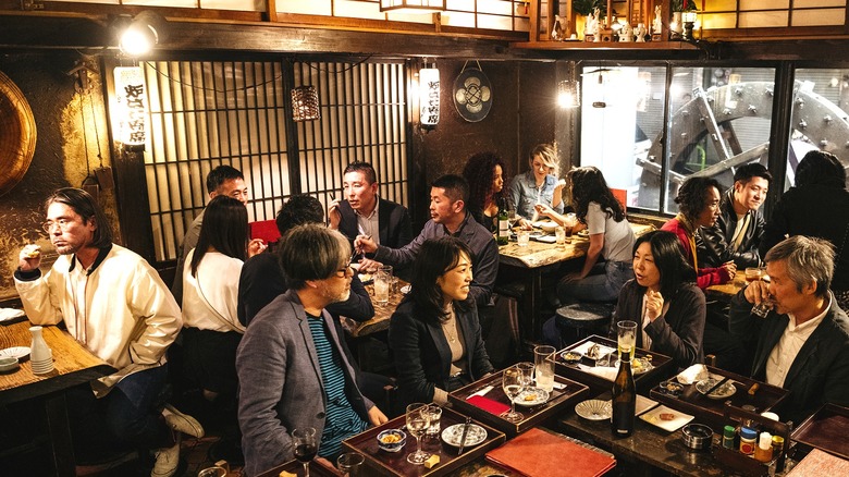 People dining in a Japanese restaurant