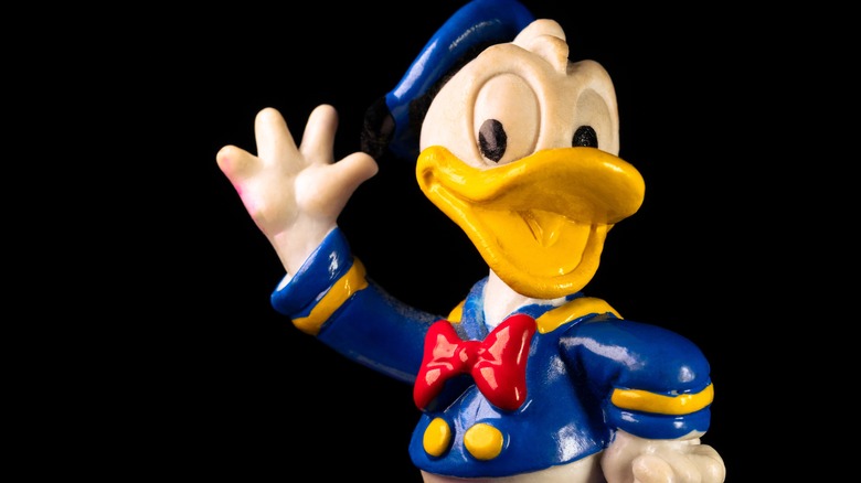 Vintage Donald Duck character waves and smiles