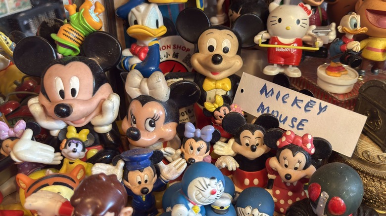 vintage Mickey and Minnie Mouse toys on display