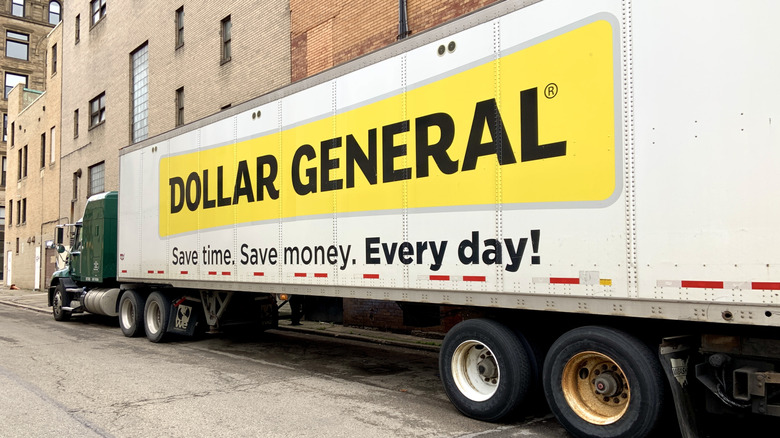A Dollar General shipping truck parked on the street.