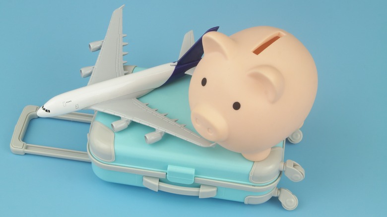 Piggy bank with suitcase