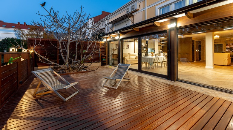 a deck outside a house
