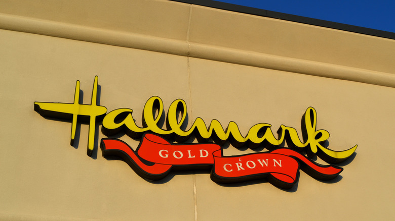 A slightly dingy-looking Hallmark Gold Crown store sign