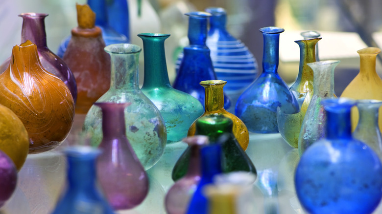 Numerous colorful glass vases