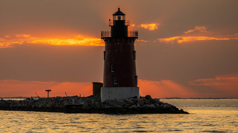 lighthouse in the sunset