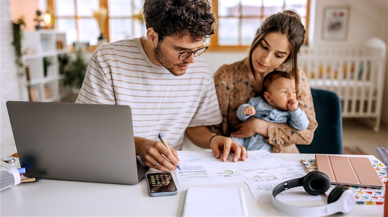 Young couple budgeting at home