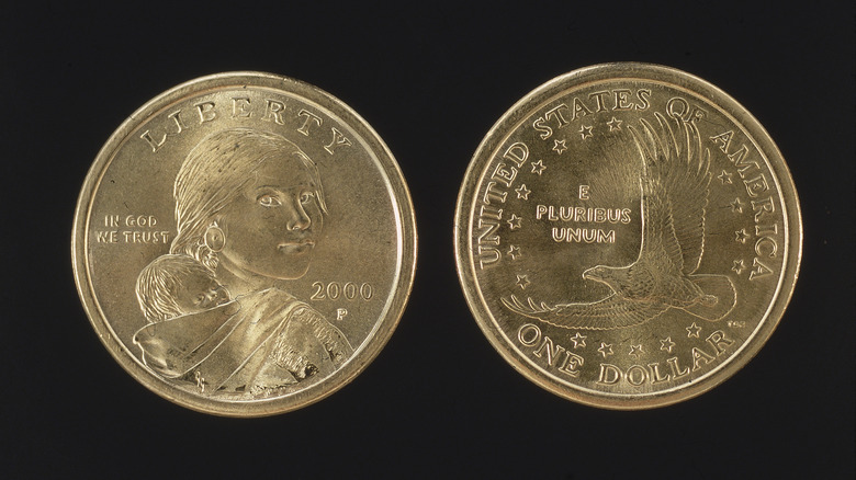 The front and back of a Sacagawea dollar coin
