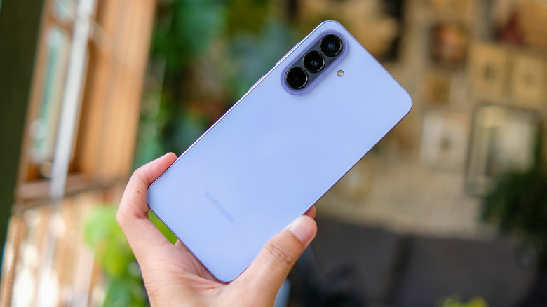 An Android user holding a Samsung Galaxy phone at an angle
