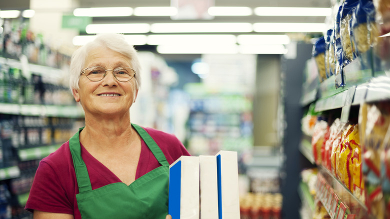 Mature woman working at store