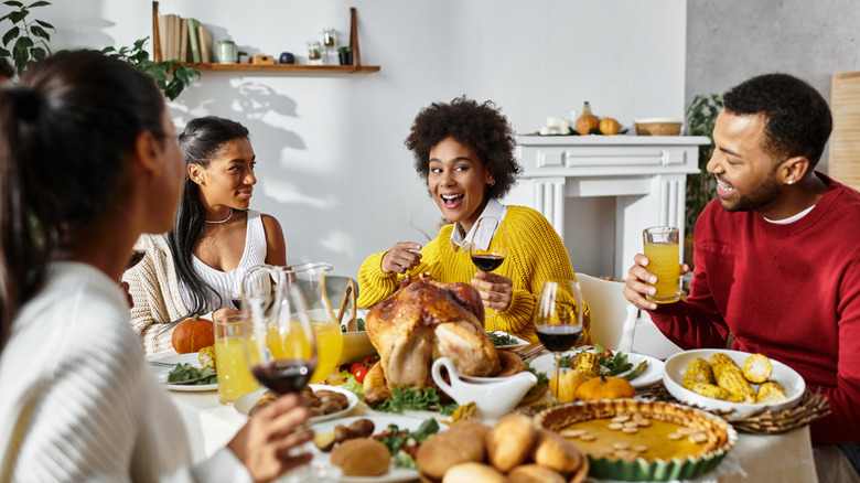 Family having Thanksgiving dinner together