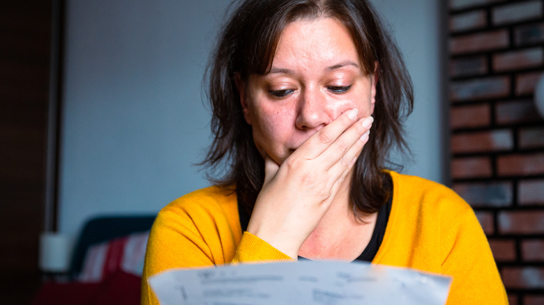 woman worried about making rent