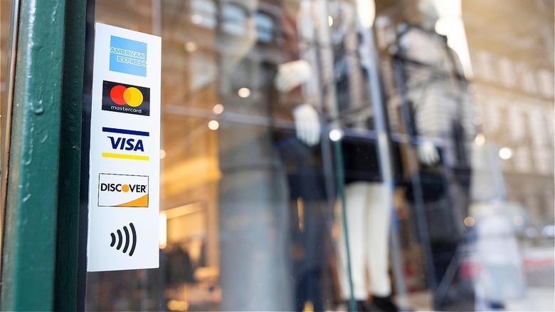 Storefront with credit card signs