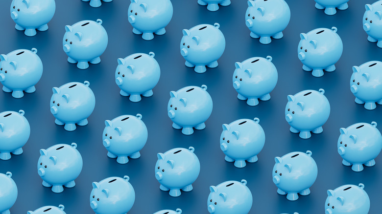 a bunch of blue piggy banks
